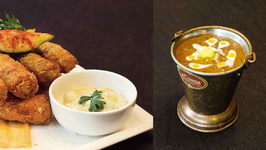 (l-r) Ajwaini Fish Finger served with tartare sauce is a crunchy small bite for bekti lovers, The signature Daal Village, black lentil slowcooked overnight in a tandoor, is a musthave
