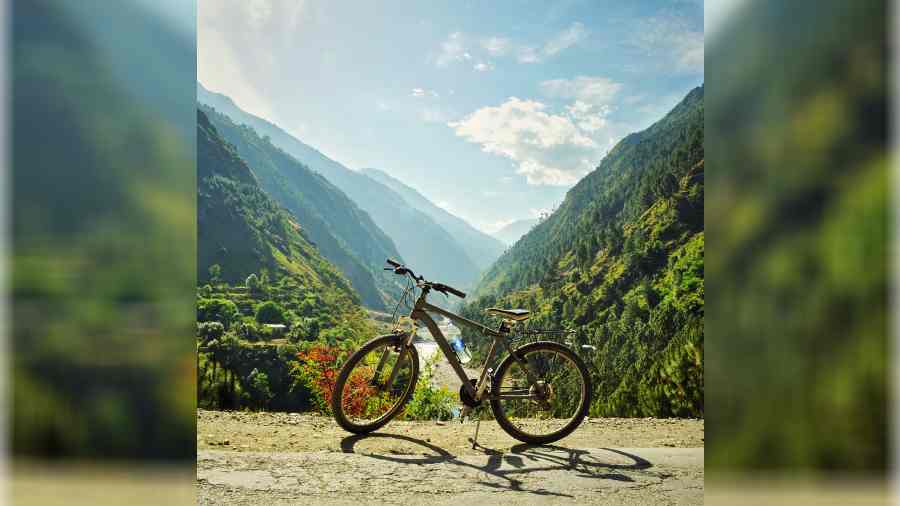 FORTUNE WHEELS: Chandan Biswas’s cycle strikes a pose in Tirthan Valley