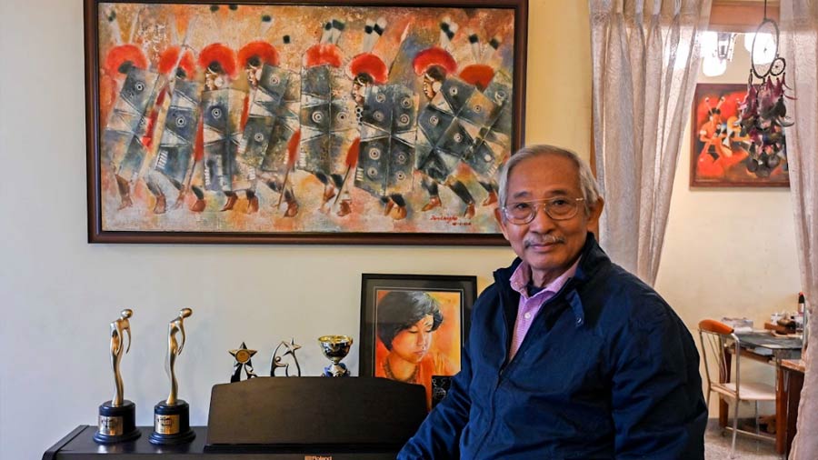 Bendangnungsang with his oil painting titled, ‘Naga War Dancers’ depicting a battalion from the state