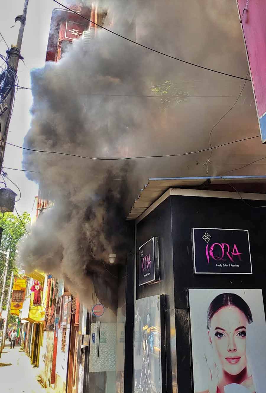 A fire broke out at a beauty parlour in Sovabazar on Wednesday. Two fire engines reached the spot and put out the fire. The area was covered in dense smoke. A fault in an air-conditioner might have caused the fire, fire brigade officers said. No casualties were reported   