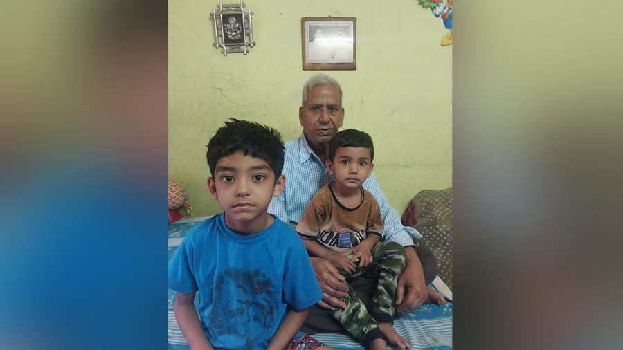 Swapan Kumar Dutta with his grandsons