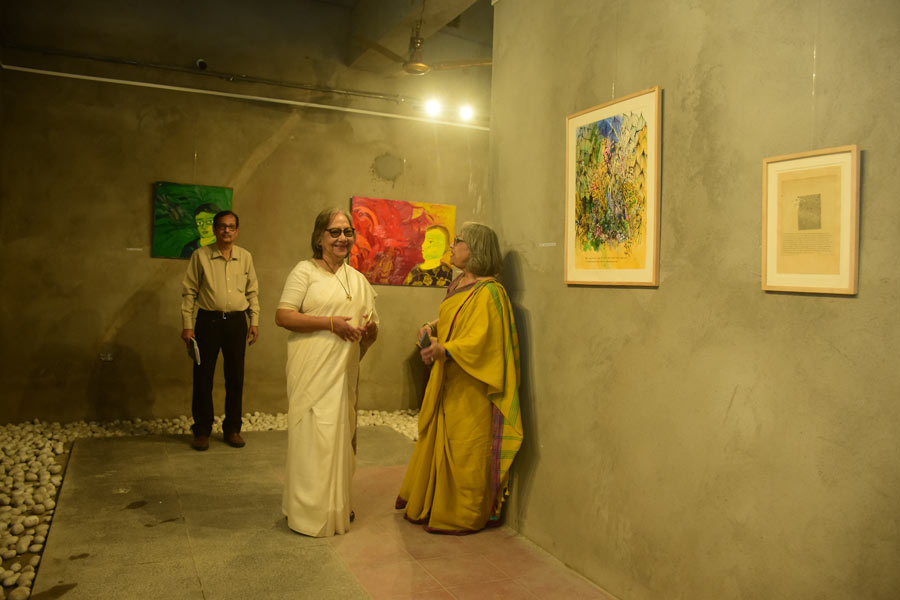 Shanta Ghosh talks to artist Shipra Bhattacharya at the exhibition of local art mounted at the fairgrounds