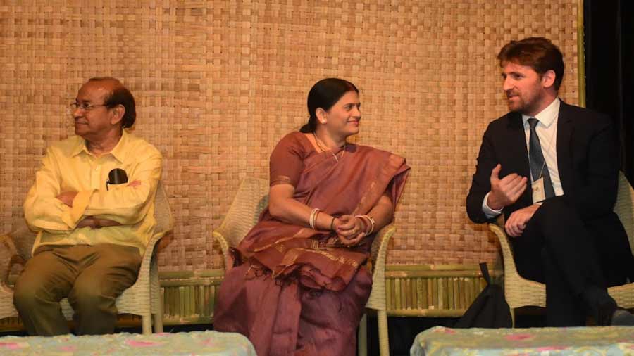 Subir Chakraborty and Nicolas Facino share the stage with  Parna Ghosh, chairperson, Bolpur Municipality