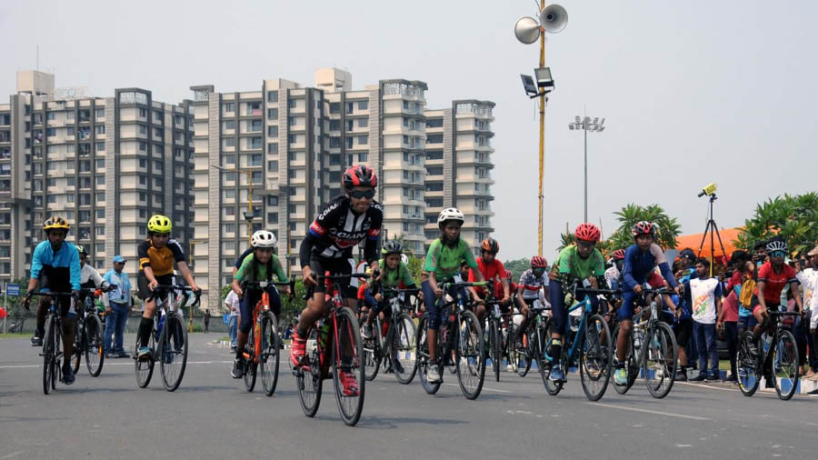  Cyclists participate in the Khelo India Women's Track Cycling League at New Town on Sunday. Footballer Mehtab Hussain was present at the event to give away prizes to the winners   