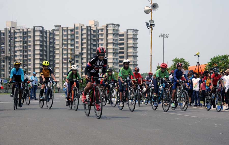  Cyclists participate in the Khelo India Women's Track Cycling League at New Town on Sunday. Footballer Mehtab Hussain was present at the event to give away prizes to the winners   