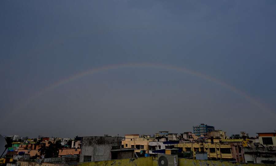 A rainbow adorns the Kolkata sky on Tuesday afternoon amid the rain and clouds  