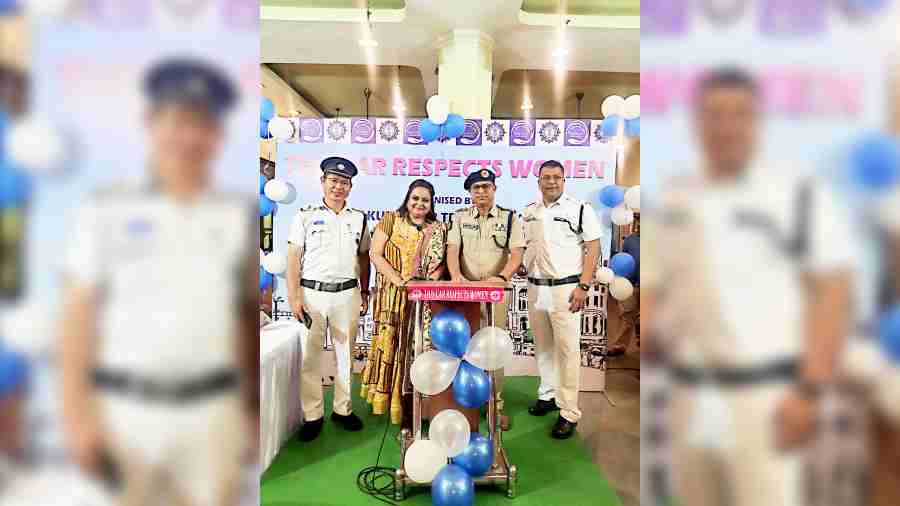 Jeena Mitra Banik with the assistant commissioner of police, traffic, Behala division, Aloke Sanyal (second from right) and officers of Thakurpukur Traffic Guard at the launch of ‘This Car Respects Women’ initiative.