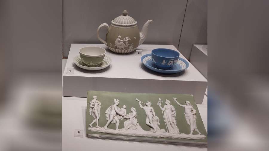 (Top) Wedgwood pottery in white Jasper, green and blue dip. (Above) A tablet depicting birth of Bacchus