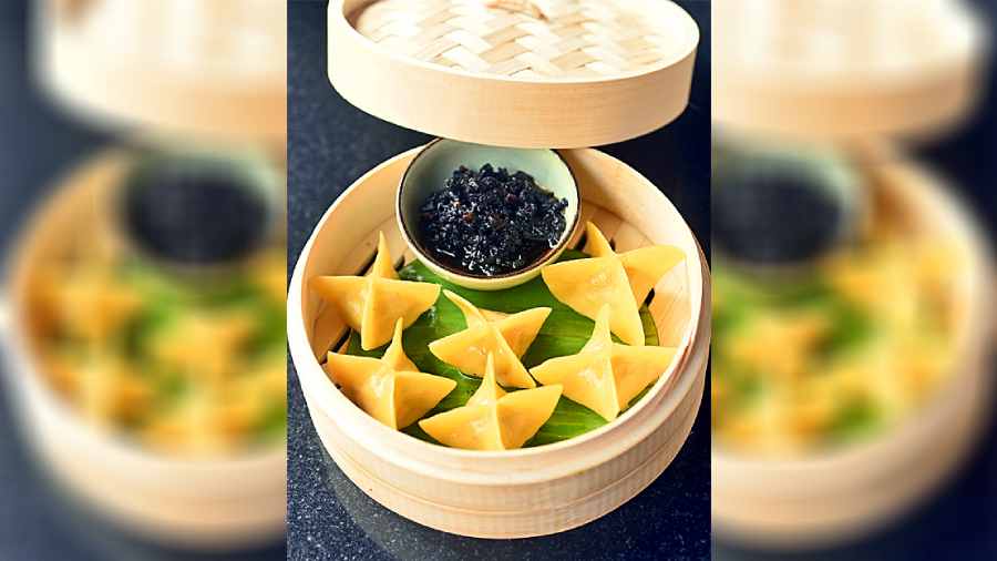 Corn Water Chestnut Flower Dumpling: These dumplings borrow the popular water chestnut from Thai cuisine, and combine it with corn for a crunchy filling. We love the floral pattern of moulding the dumpling.