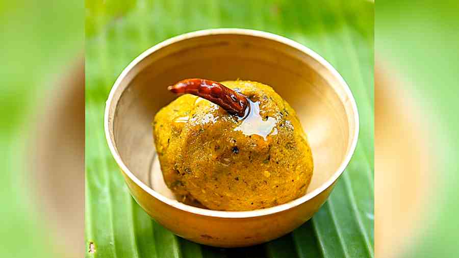 Kumro Phool Maach Bata: This bharta is made using pumpkin flowers and locally available fresh water fish. The smell of mustard is a dominant profile here, and it tastes lovely with steamed rice.