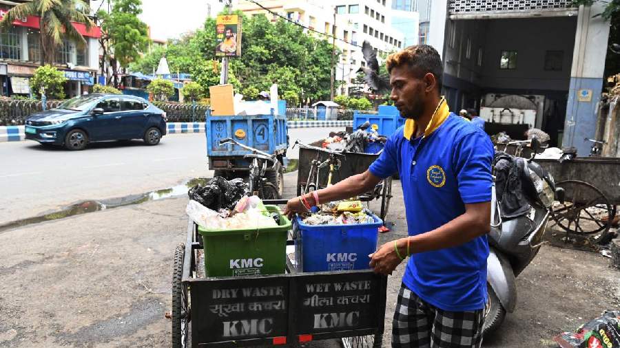 Plastic bags of garbage thrown in KMC’s green bin, meant for biodegradable waste, at a collection centre on the Rashbehari connector last week. Residents are to empty out the contents of plastic bags containing biodegradable waste, like kitchen waste, into the green bins and then throw the plastic bag in the blue bins, meant for non-biodegradable waste, said a KMC official