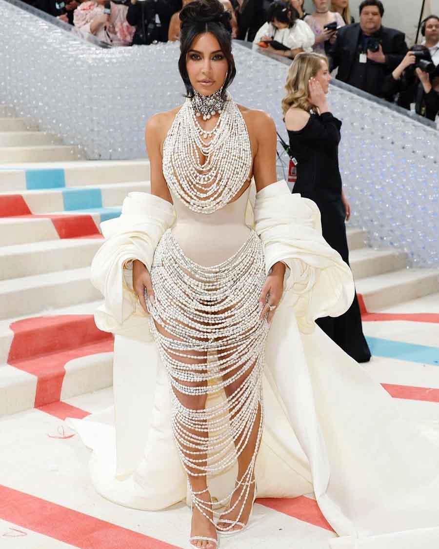 Kim Kardashian wore a 50,000 pearl-adorned naked dress inspired by her famous 2007 Playboy photoshoot for the event. The look was accessorised with white puff sleeves and a diamond choker. 