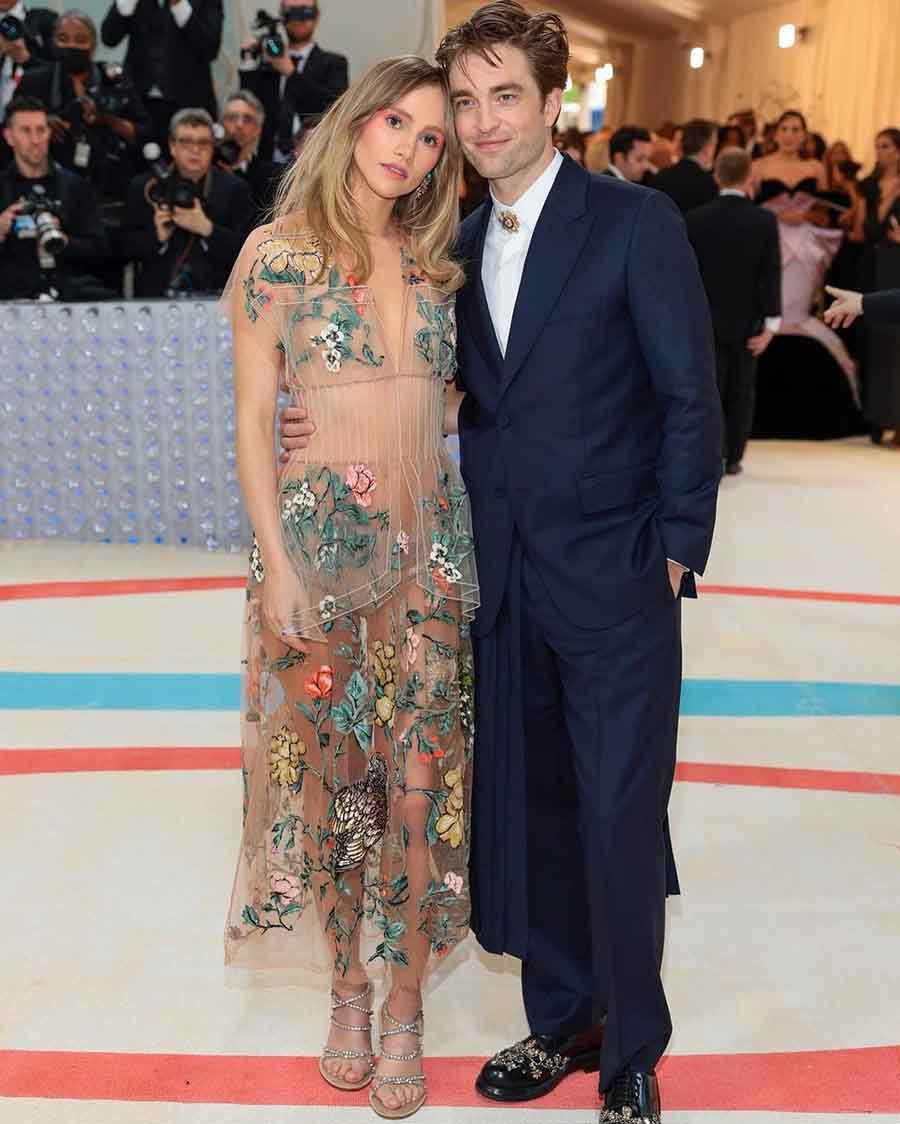 Robert Pattinson and Suki Waterhouse made their MET Gala debut together. Suki wore a sheer floral Fendi gown, while Robert complemented her in a blue Dior suit. 
