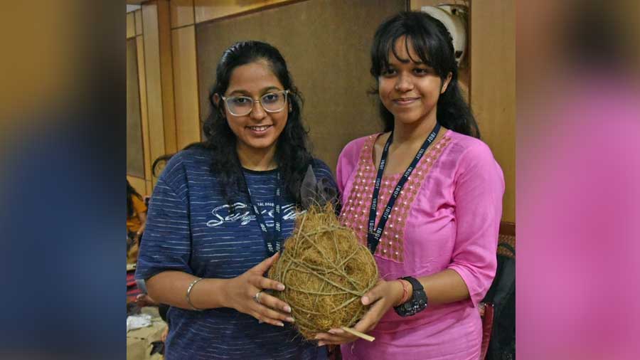 Mansi Jaria and Sanhita Ghosh posing with their handmade nests 