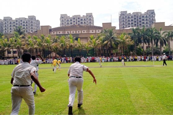 DPS Megacity students rushing into the field after winning the finals 