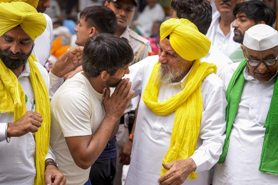 Wrestler Bajrang Punia with farmers during the latter's demonstration in support of the wrestlers protesting against Wrestling Federation of India (WFI) chief Brij Bhushan Sharan Singh, at Jantar Mantar in New Delhi.