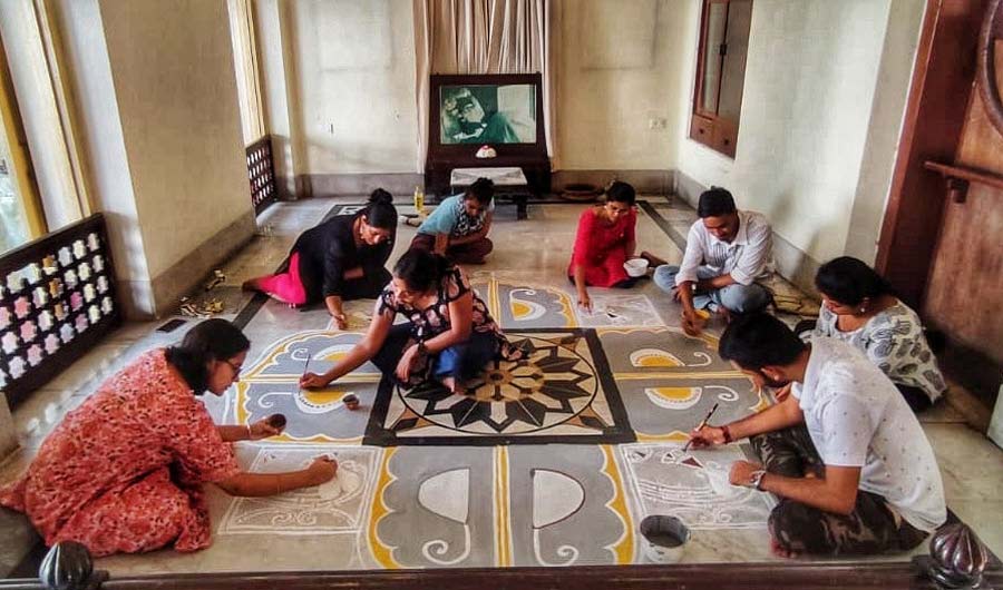 Students busy drawing alpana at Jorasanko Thakurbari on Saturday. Rabindra Jayanti or Pochishe Baisakh, Rabindranath Tagore’s birth anniversary, falls on May 9 this year  