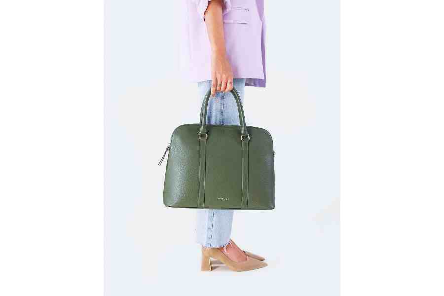 An aesthetically designed olive green laptop friendly office bag that adds elegance and sophistication to a working woman’s everyday style