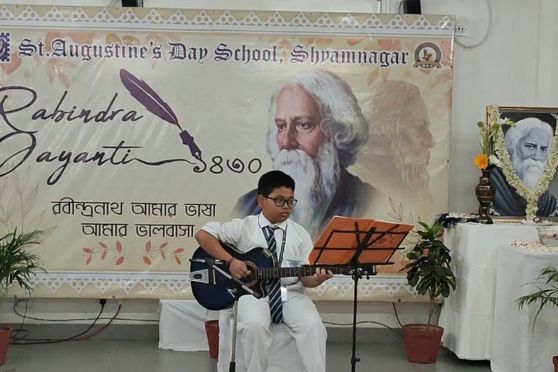 Rabindranath Tagore known for his diverse literary talent,  included poetry, songs, short stories, and plays. To celebrate the day, a young child sings a solo on one of his songs.