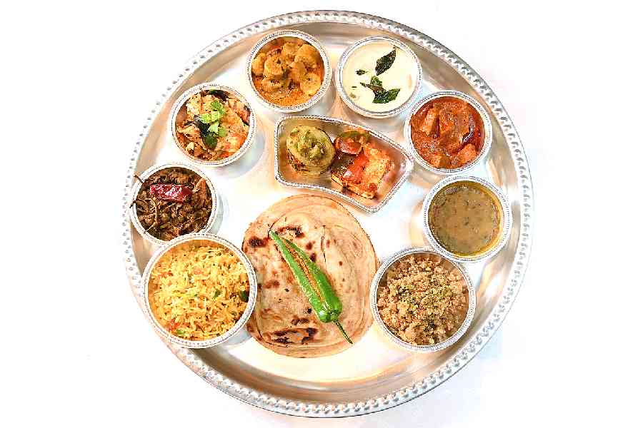 The spread from The Royal Kitchens of Jodhpur offers an array of signature Rajasthani vegetarian and non-vegetarian delicacies such as Mathania Paneer Tikka, Mathania Mirchi Murgh Ka Soola, Charka Murgh, Chakki ka Saag, Ker Sangri Dhak Khada Masala, Rabodi Hara Pyaz, Laal Maans, and Murgh Jodhpuri among other traditional dishes.