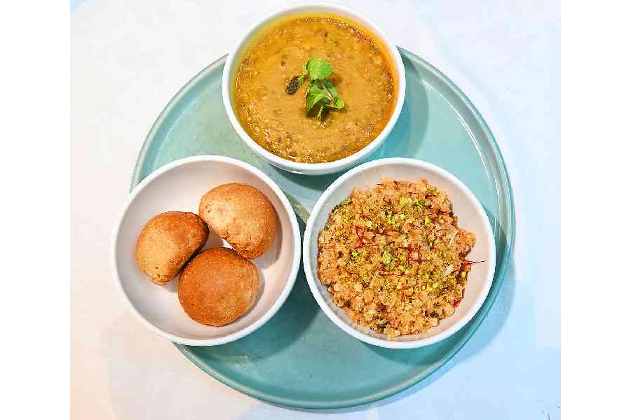 Dal Bati Churma: No Rajasthani meal is complete without a simple dal, gheeloaded baked dough called bati, and a special mildly sweet dry halwa of sorts called churma.
