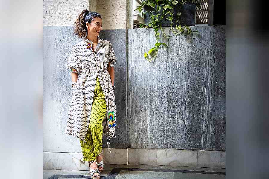 Bonbibi will present Travelling Trunks. We love the play of geometry in this piece on Sanaya Mehta Vyas. “Expect breathable and light handloom (Kotpad) fabrics which are ideal for travel. Comfort and style is what this collection is all about. Sequins and patchwork on stripes and checks have made it all happen,” says Team Bonbibi.
