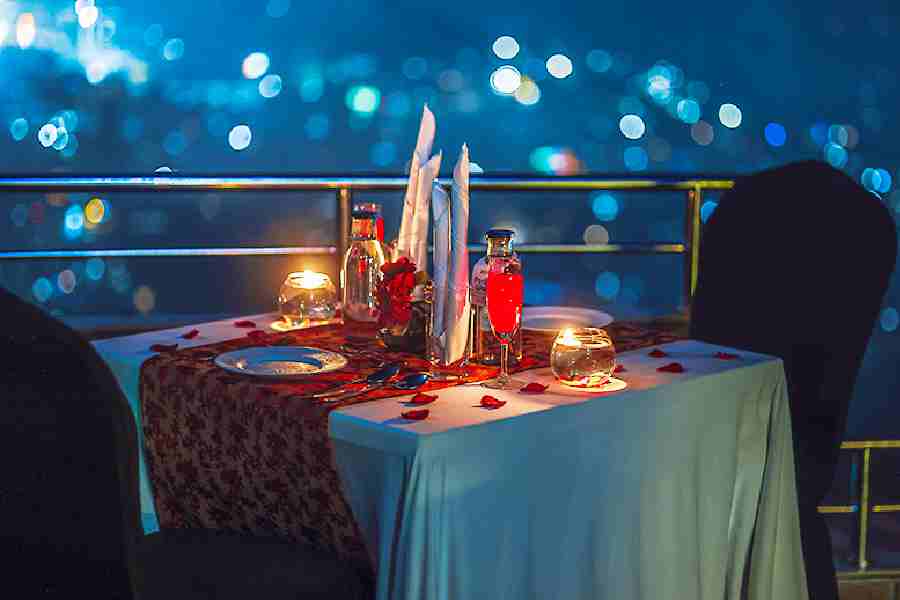 Enjoy a candle-lit dinner date with your partner on the rooftop