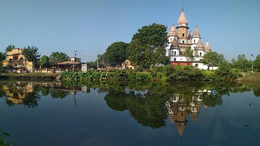 Hanseswari temple with its reflection on the water of the moat encircling the premises