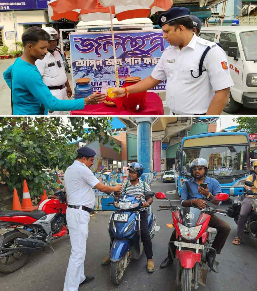 Bidhannagar Police personnel offered glucose water to people of the area on Thursday to beat the heat. The city temperature is again on the rise. The maximum recorded temperature on Thursday was 38.1˚C which is two notches above the normal mark 
