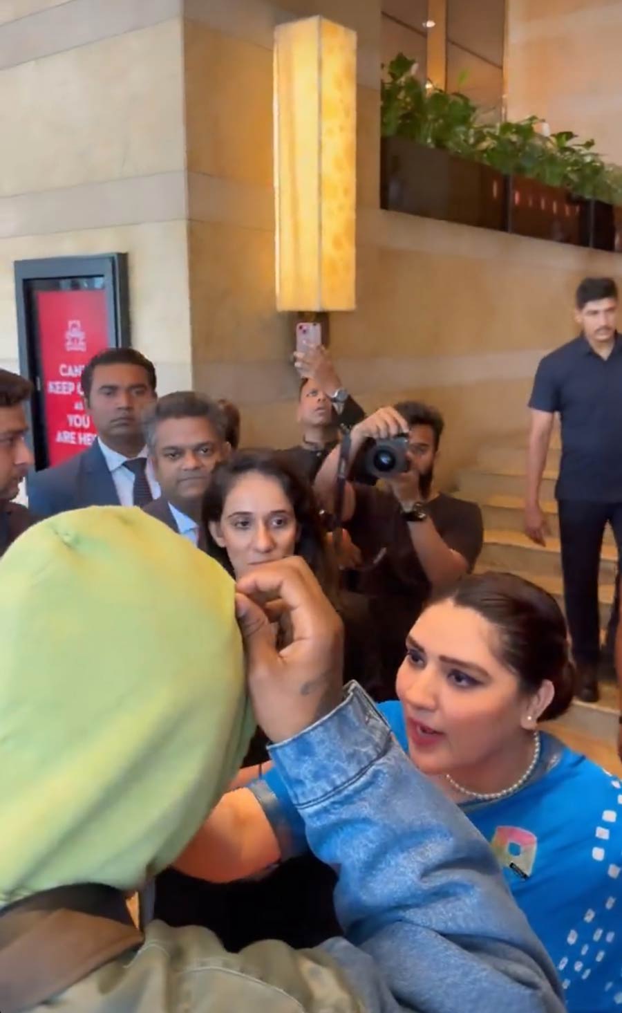 Rema was welcomed by a dance crew in Mumbai. The singer couldn’t get enough of filming the gala event.