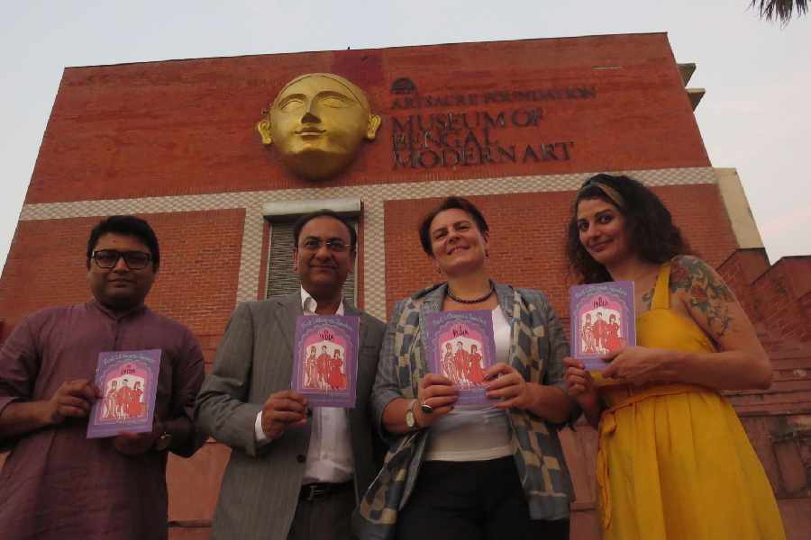Lithuania ambassador Diana Mickeviciene and comics artist Migle Anusauskaite (right) at the launch at Arts Acre on Thursday. Also present are guest and artist Avik Maitra (left) and honorary consul Arvind Sukhani.