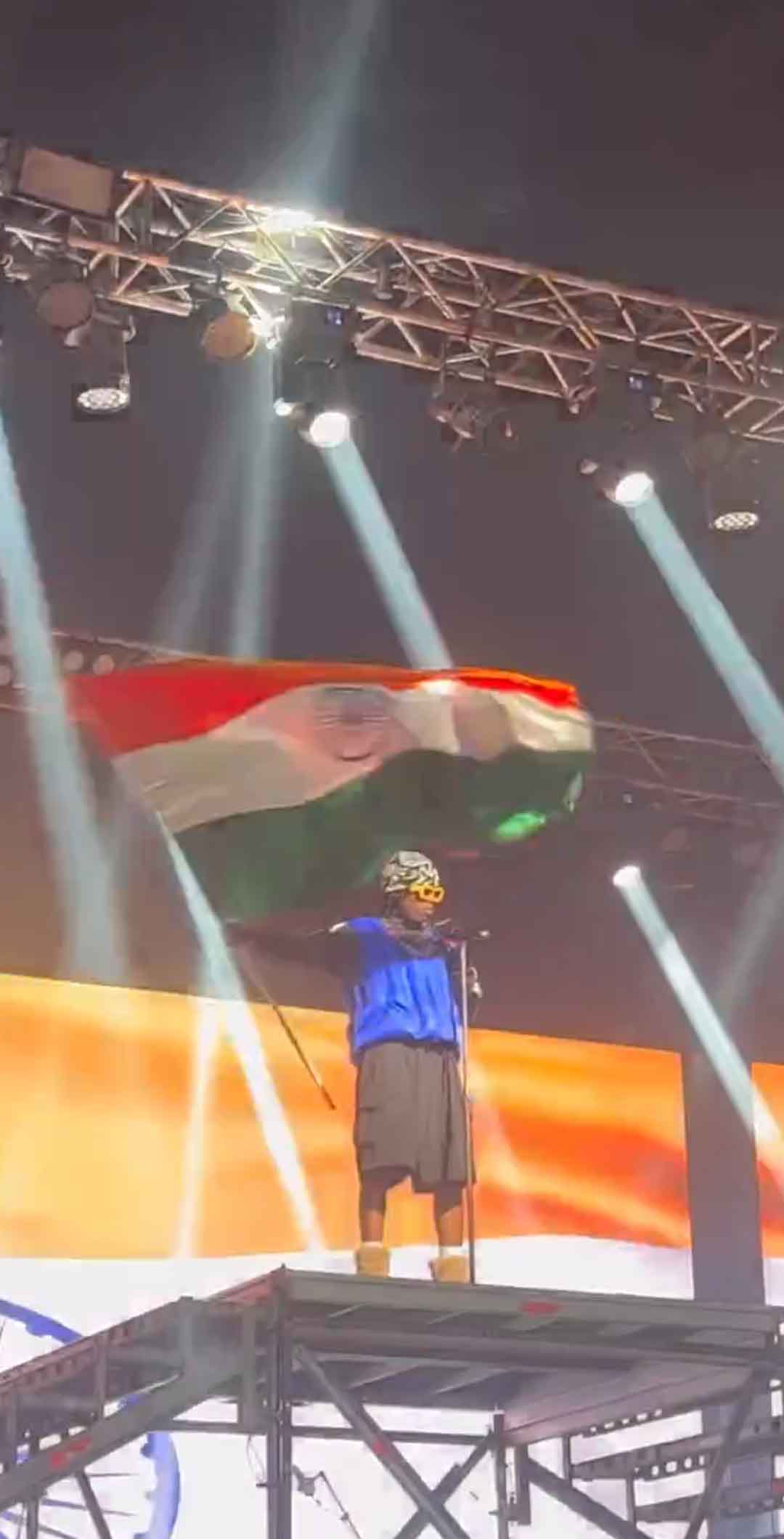 Rema with the Indian flag