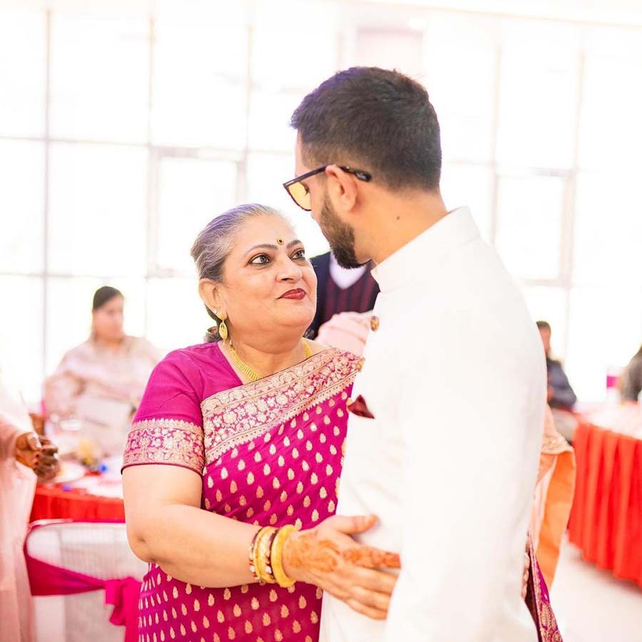Vikrant Massey celebrated the day with a photo of him and his mother from an event. 