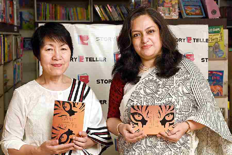 Easterine Kire (left) with author Amrita Mukherjee at Storyteller bookstore