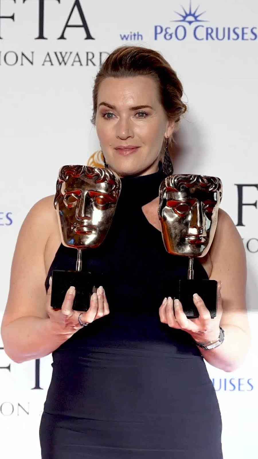 Kate Winslet showed off her first BAFTA trophy for Leading Actress, which she won for her role in I Am Ruth.