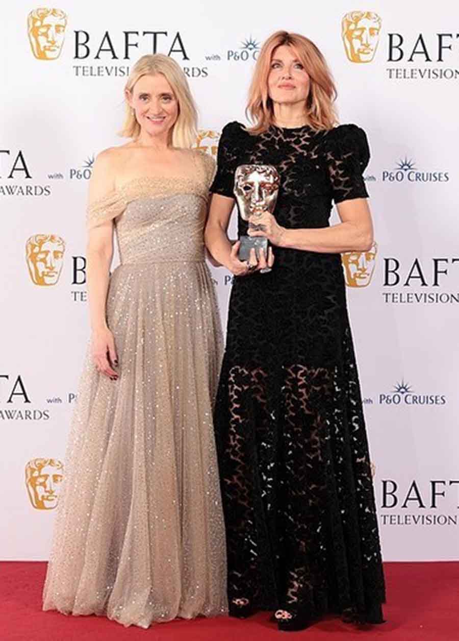 Anne-Marie Duff wore a beige semi-off shoulder dress and shared the frame with Sharon Hogan, who opted for a black gown. The two actors posed with their Drama Series Award for Bad Sisters.