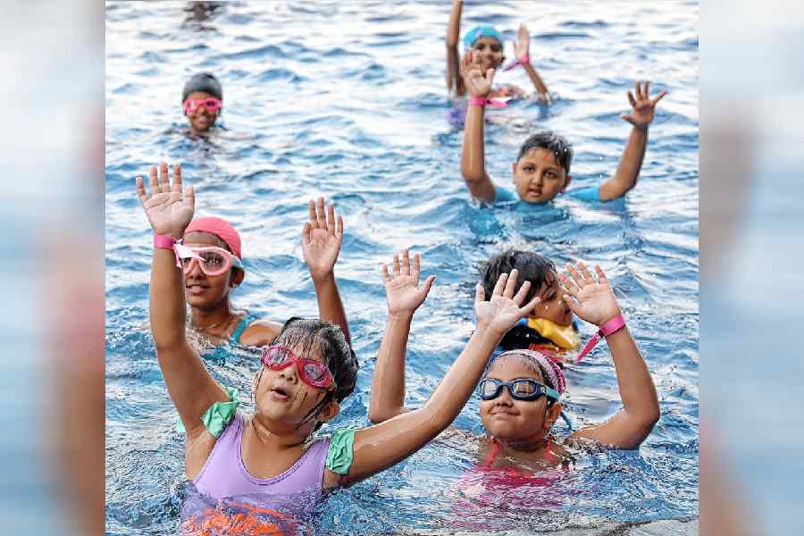 The little ones swayed and dunked in the pool during the Aqua Zumba to songs like Believer and Calm Down.