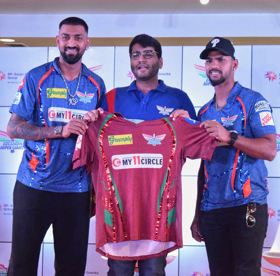 Lucknow SuperGiants owner Shashwat Goenka (centre) with the team captain Krunal Pandya (left) and player Nicholas Pooran during a press conference on Thursday for the unveiling of their jersey ahead of their IPL 2023 cricket match against Kolkata Knight Riders at Eden Gardens. The LSG will take on KKR on May 20, 2023 at 7.30pm   