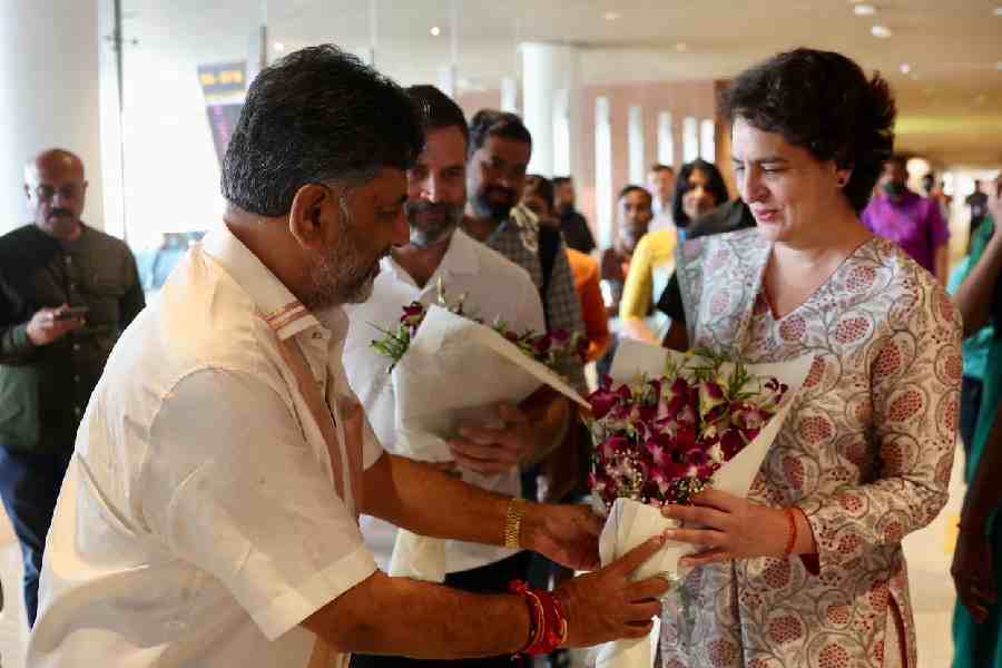 Priyanka Gandhi received a warm and enthusiatic welcome from D K Shivakumar as she arrived at Bangalore's Kempegowda International Airport to attend the sworn-in ceremony