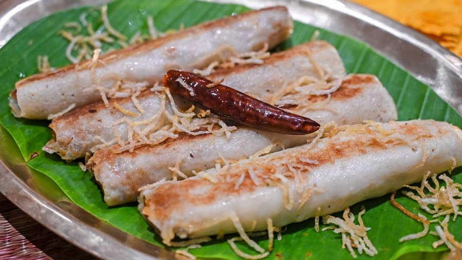 Dishes like the Rui Maacher Patisapta (featured) and Chitol Muitha come from family recipes  
