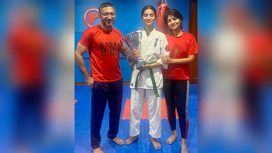 Rishika with her parents Mayukh and Sharanya Banerjee