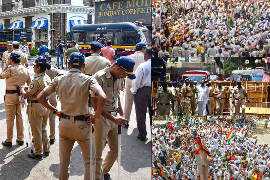 NCP leader Jayant Patil arrives at ED office amid tight security, agitated protesters gather in front of ED's South Mumbai office
