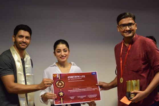 The winners of our various events receiving their prizes from Arjun and Isha