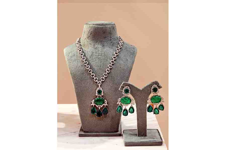 Complete your simple cocktail party look with this necklace with cubic zirconias. Rs 14,500