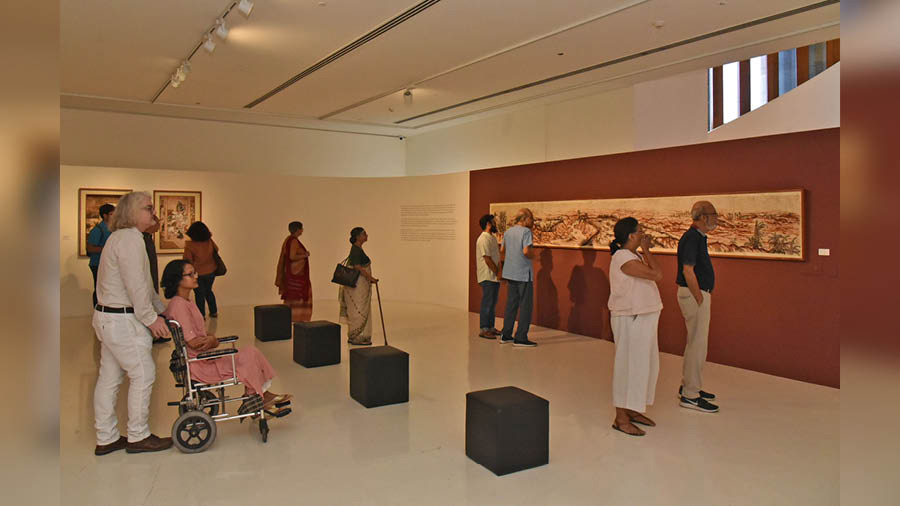 Art connoisseurs browse through the collection