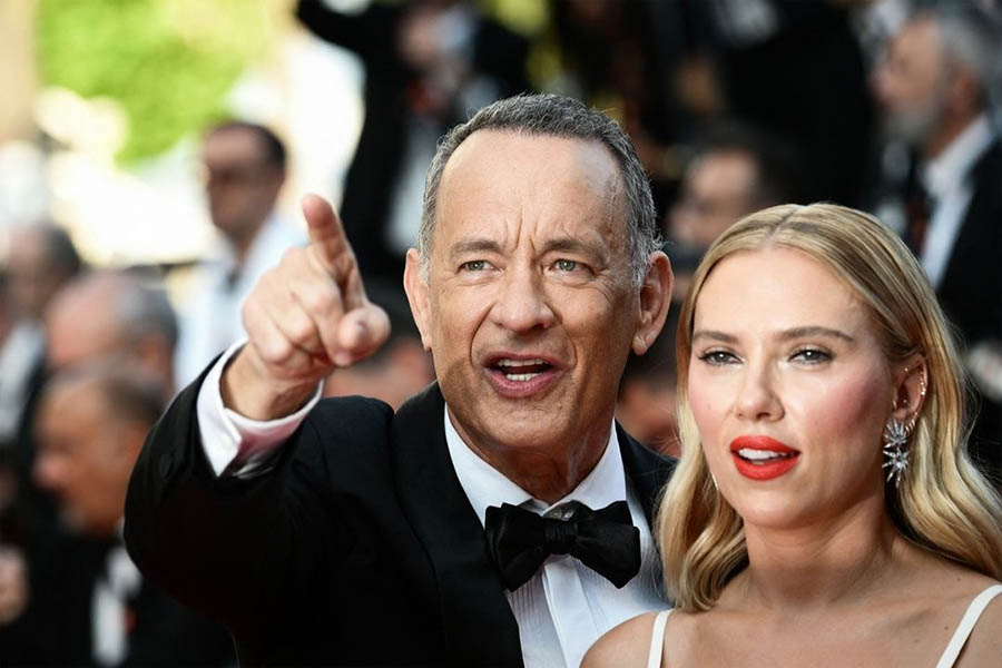 Co-stars Tom Hanks and Scarlett Johansson pose together on the Cannes red carpet.  