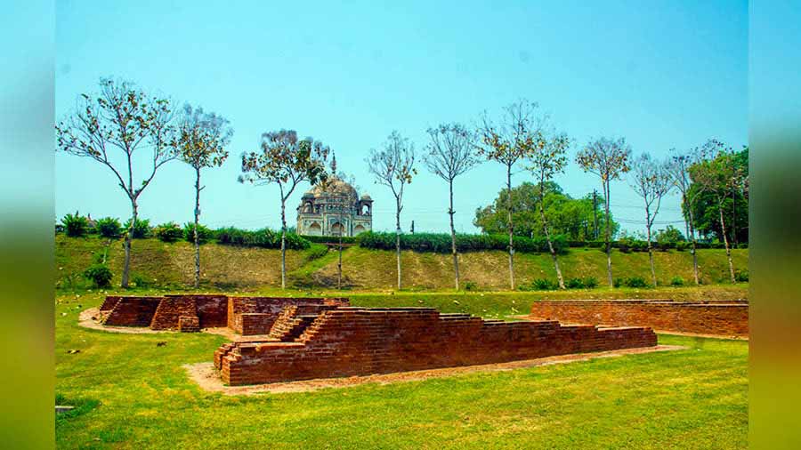 Tomb of Lal Khan towers above the archeological sites of Rajghat