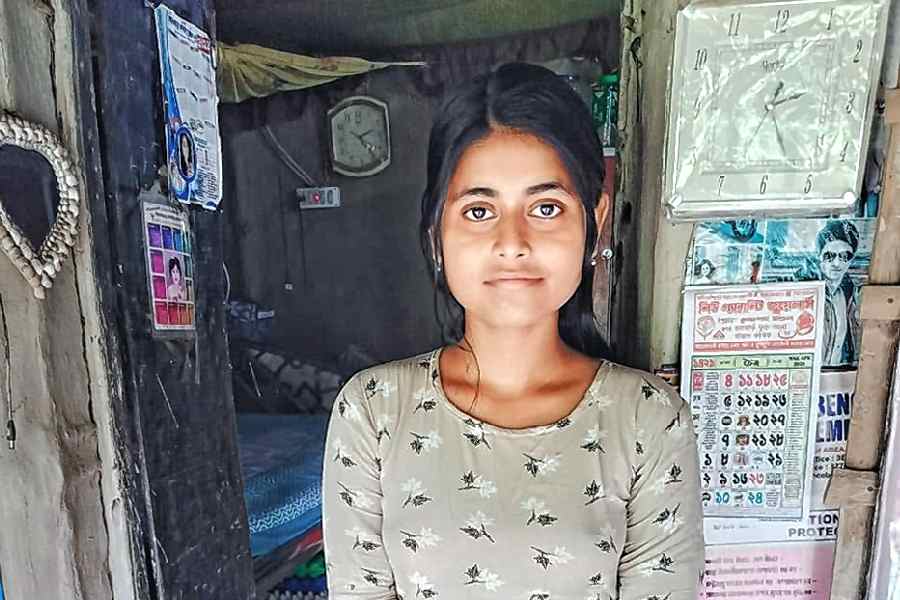 PRITI MONDAL: Topped her school. She delivers mail in Hingalganj to support her family and fund her education