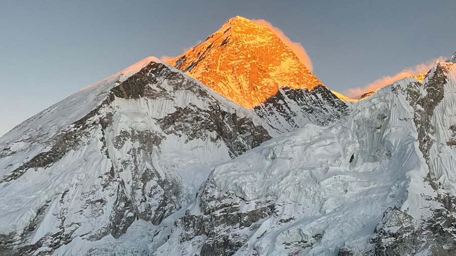 Everest aglow at sunset. This was our most memorable sighting of the mountain and we got it from atop Kalapathar. Many trek up this 5550-metre peak from Gorakshep to see the Everest from up close. Most attempt the climb in the morning because the weather can deteriorate later in the day. We took our chance in the afternoon and were amply rewarded
