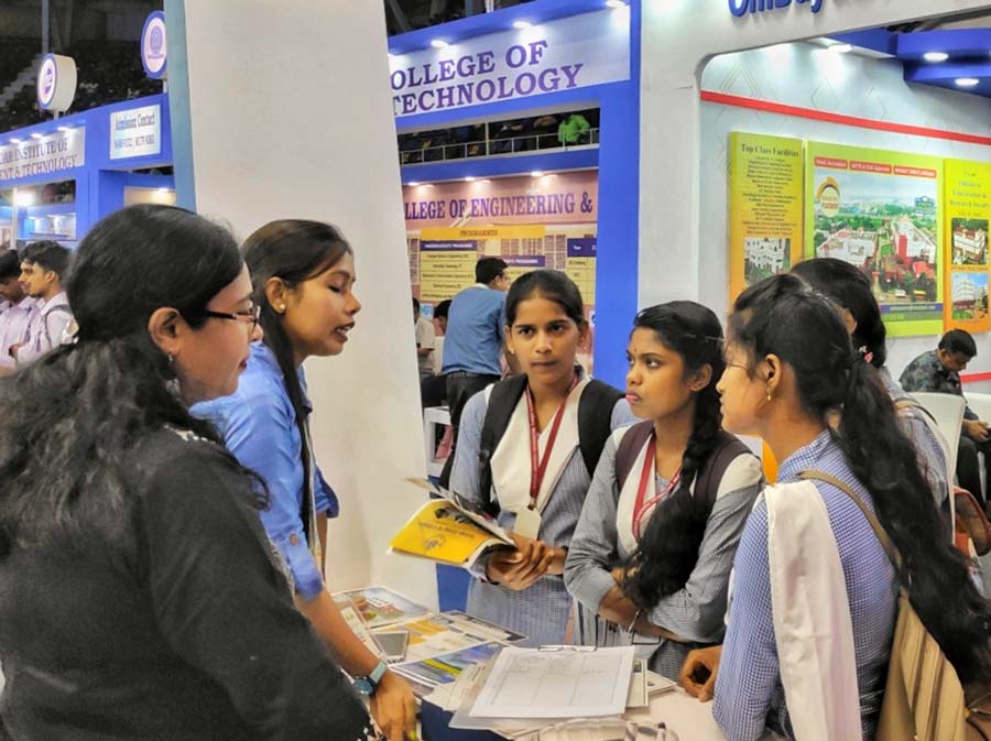  Students at an education fair that was inaugurated at the Netaji Indoor Stadium on Friday. The fair will end on Sunday